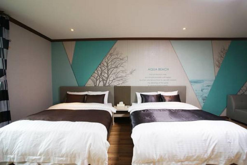 Seongsan Aqua Beach Hotel Seogwipo Room photo